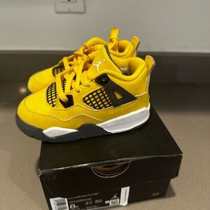 Kids Yellow Nike Jordan 4 lightning size 8c boys and girls Sneakers